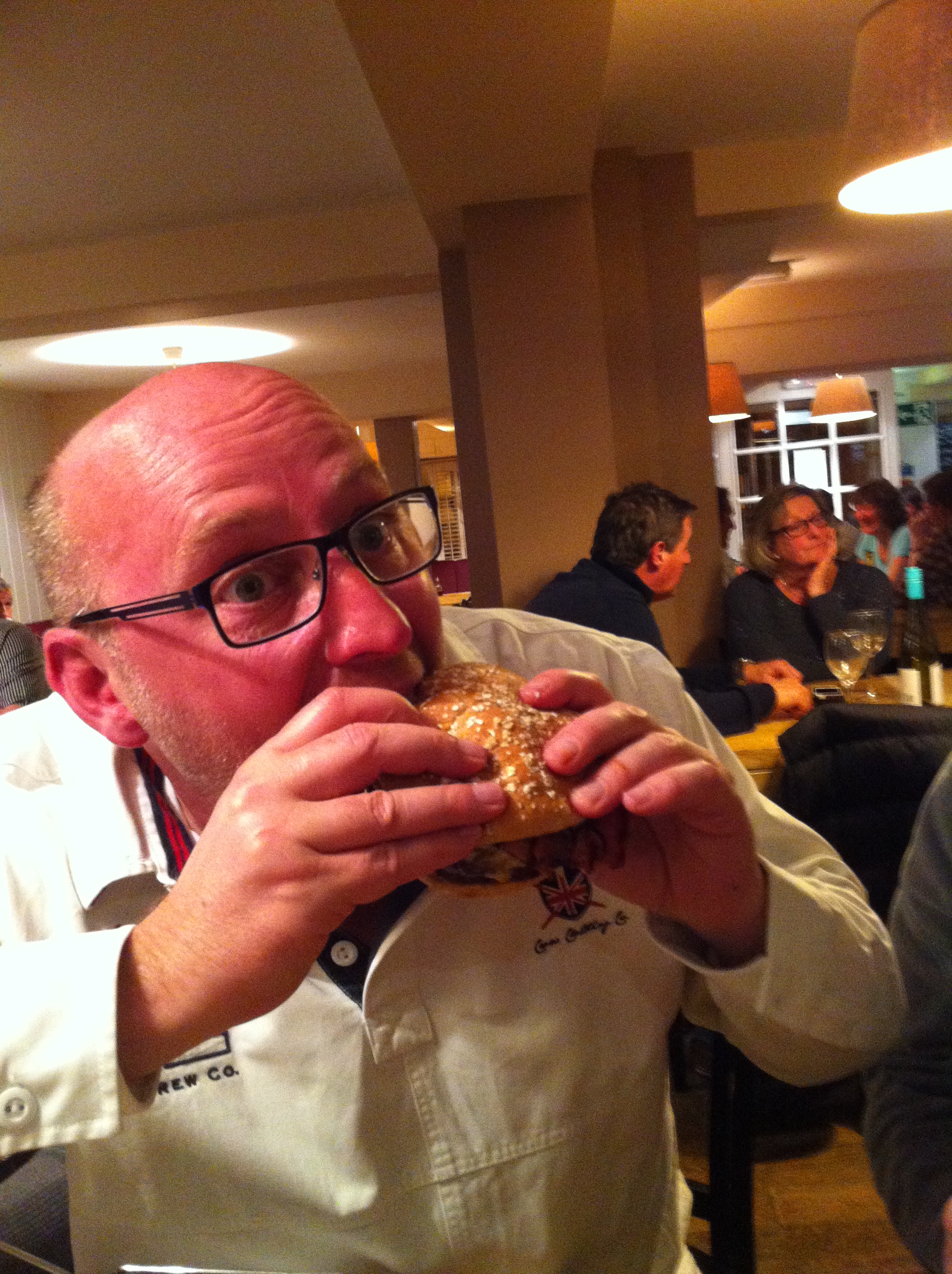 Mark Tucks into a Fat Shawn burger.